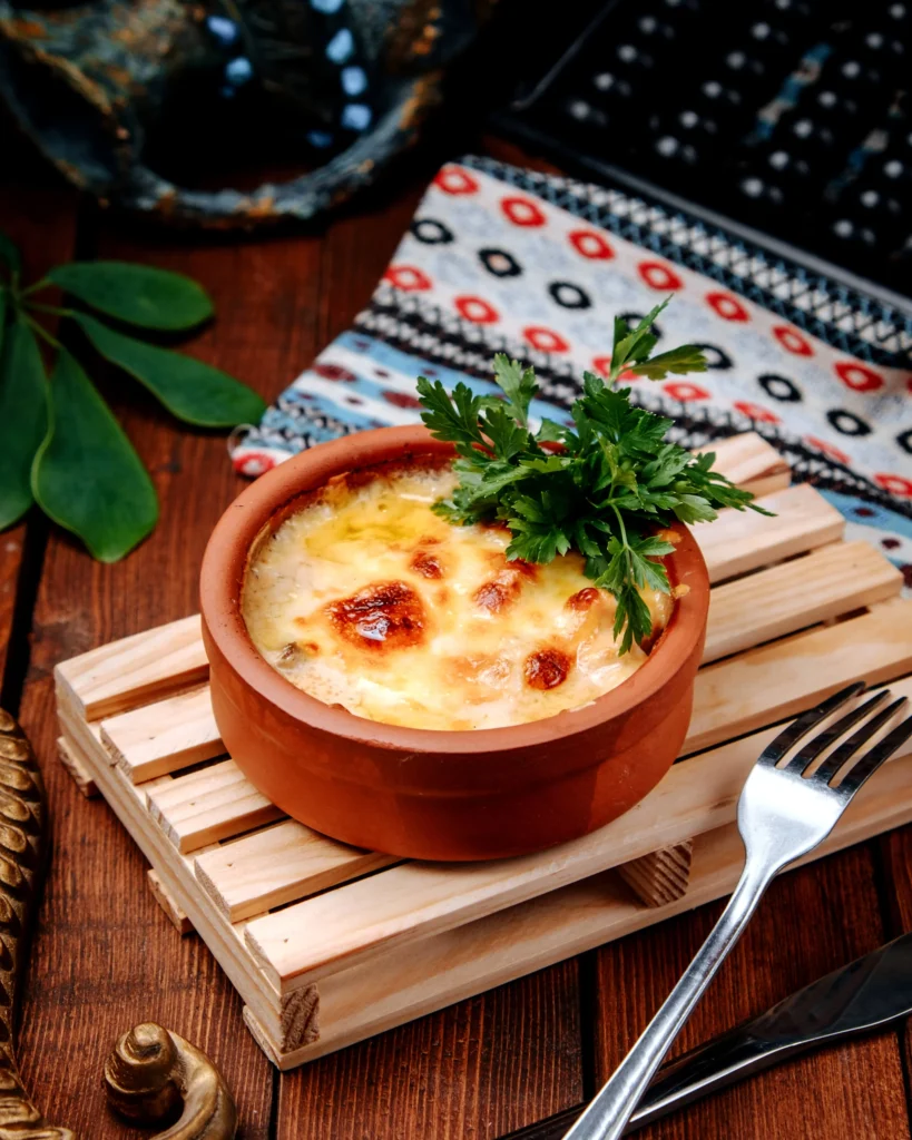 Golden Caramelized Crab Brulee in a White Ramekin